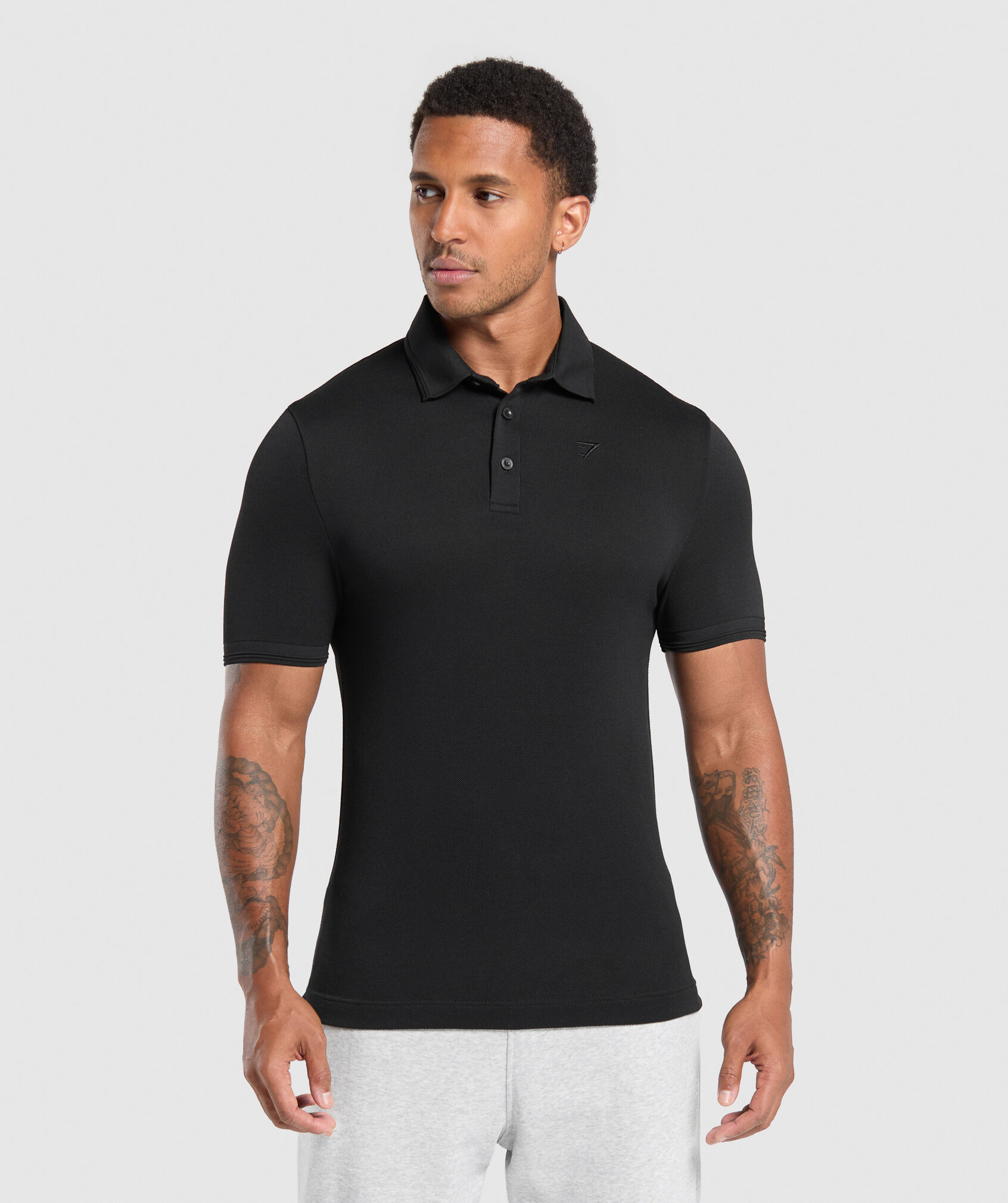 Shop Flat Knit Polo Shirt Black - Gymshark Oman