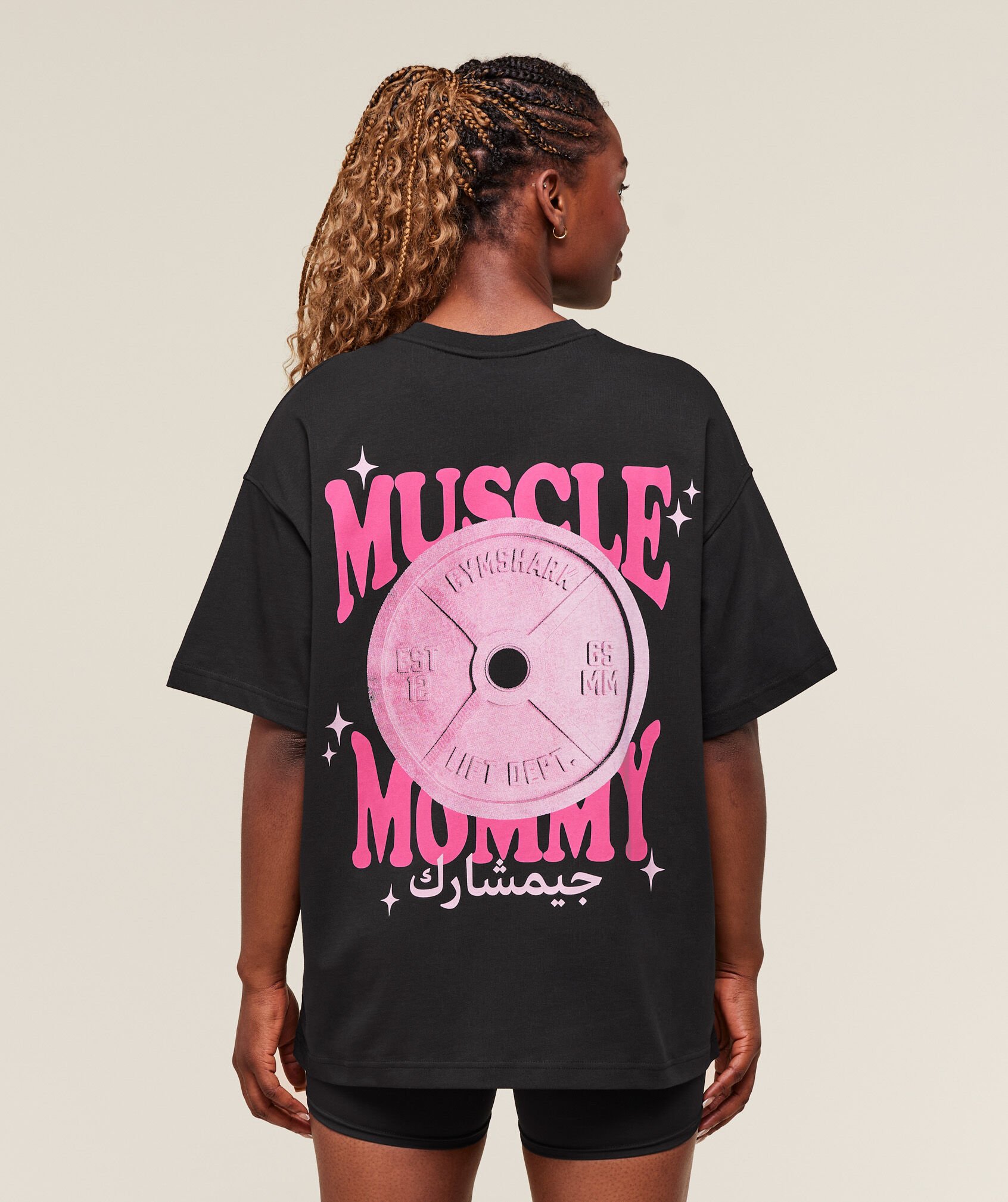 Shop Muscle Mommy Arabic Graphic T-Shirt Black/Physical Pink