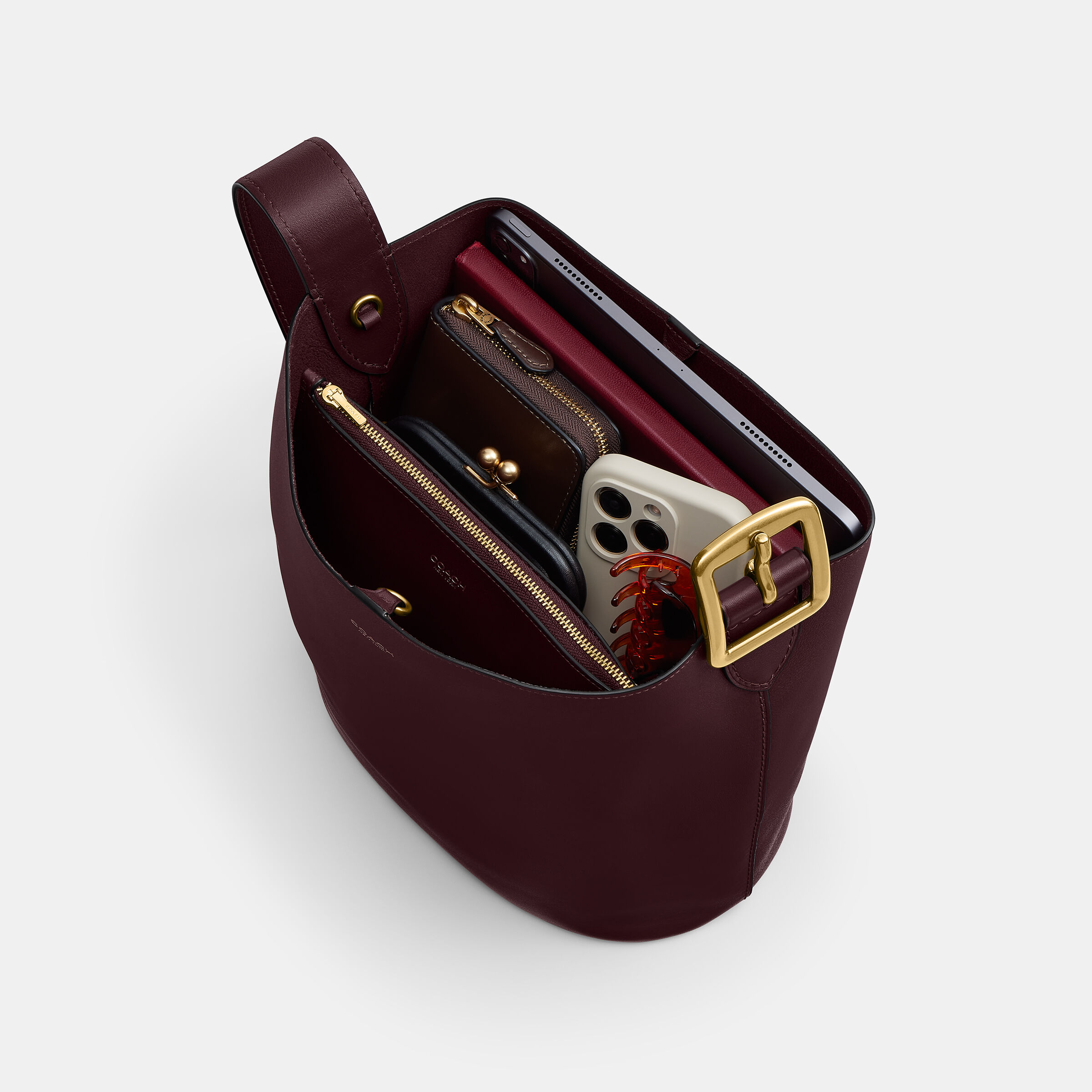 Buy COACH Bleecker Bucket Bag BURGUNDY Online in Kuwait