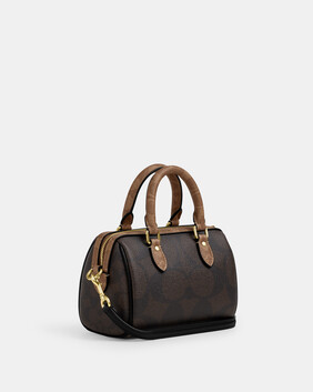 حقيبة كروس بودي روان صغيرة بتصميم مقسم بألوان قماش قنب مغلف بشعار الماركة