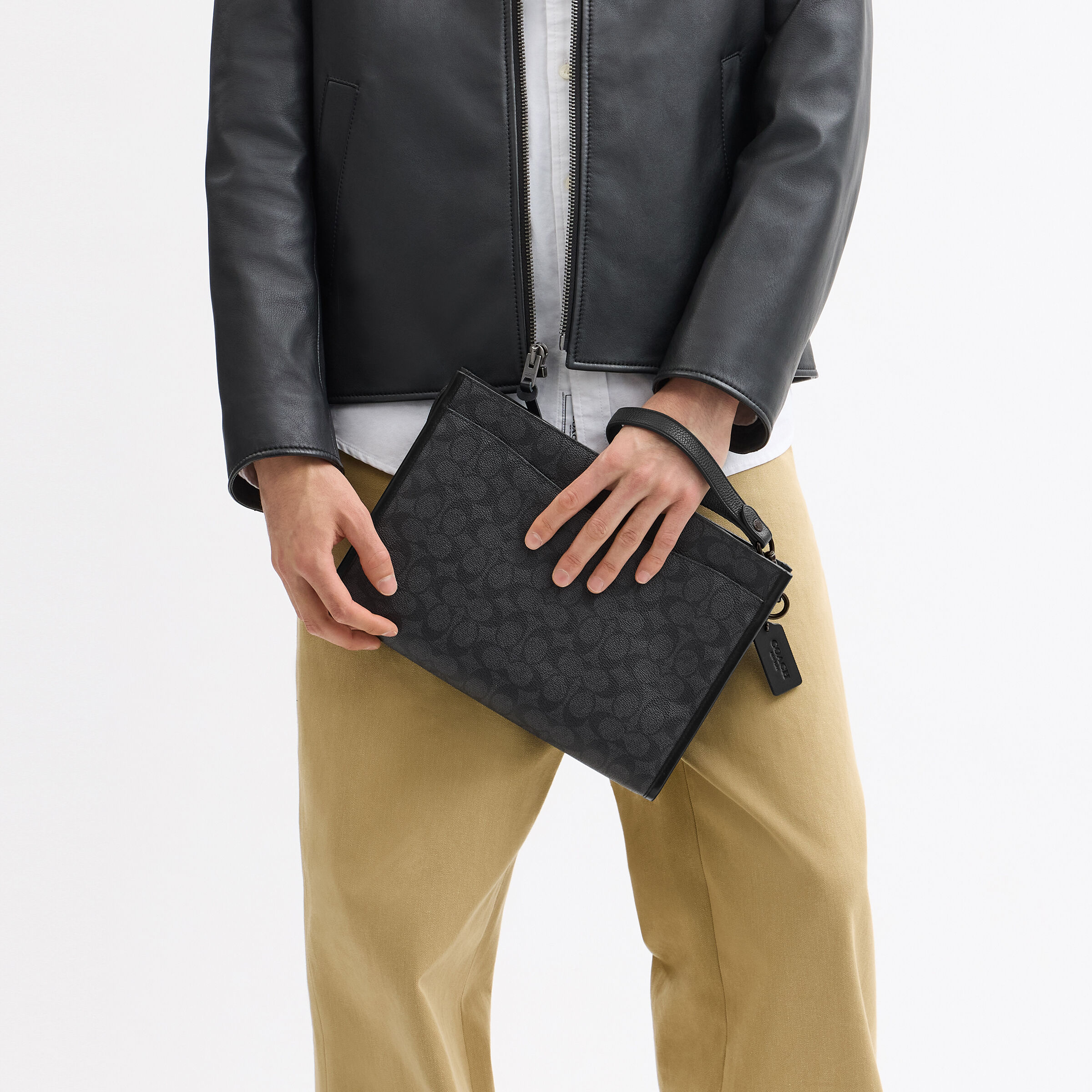 Buy COACH Charter Pouch In Signature Canvas Black Online in UAE