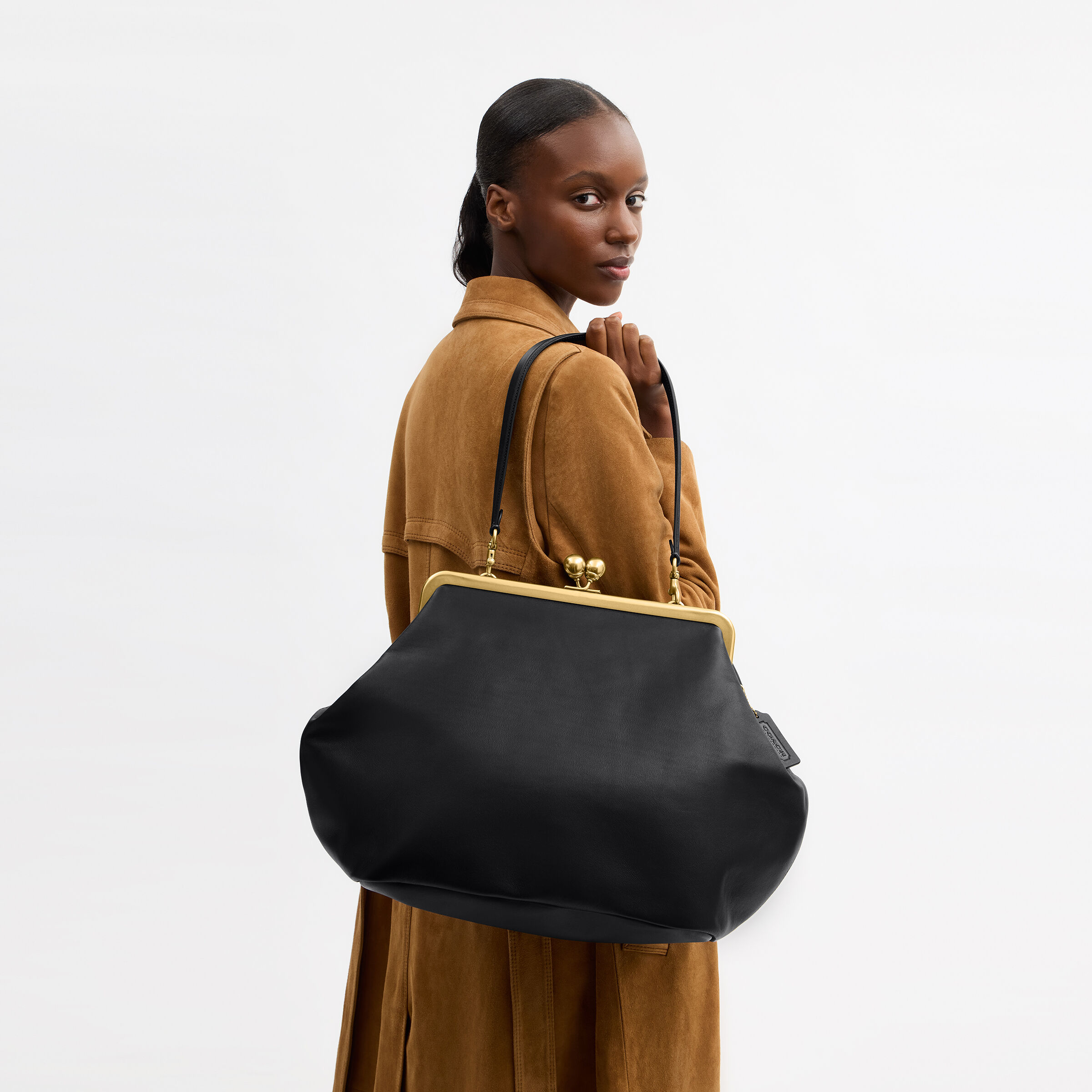 Buy COACH Large Kisslock Frame Bag Black Online in UAE