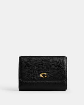 حافظة بطاقات إسنشال بغطاء قلاب