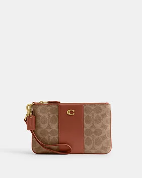 Small Wristlet In Signature Canvas