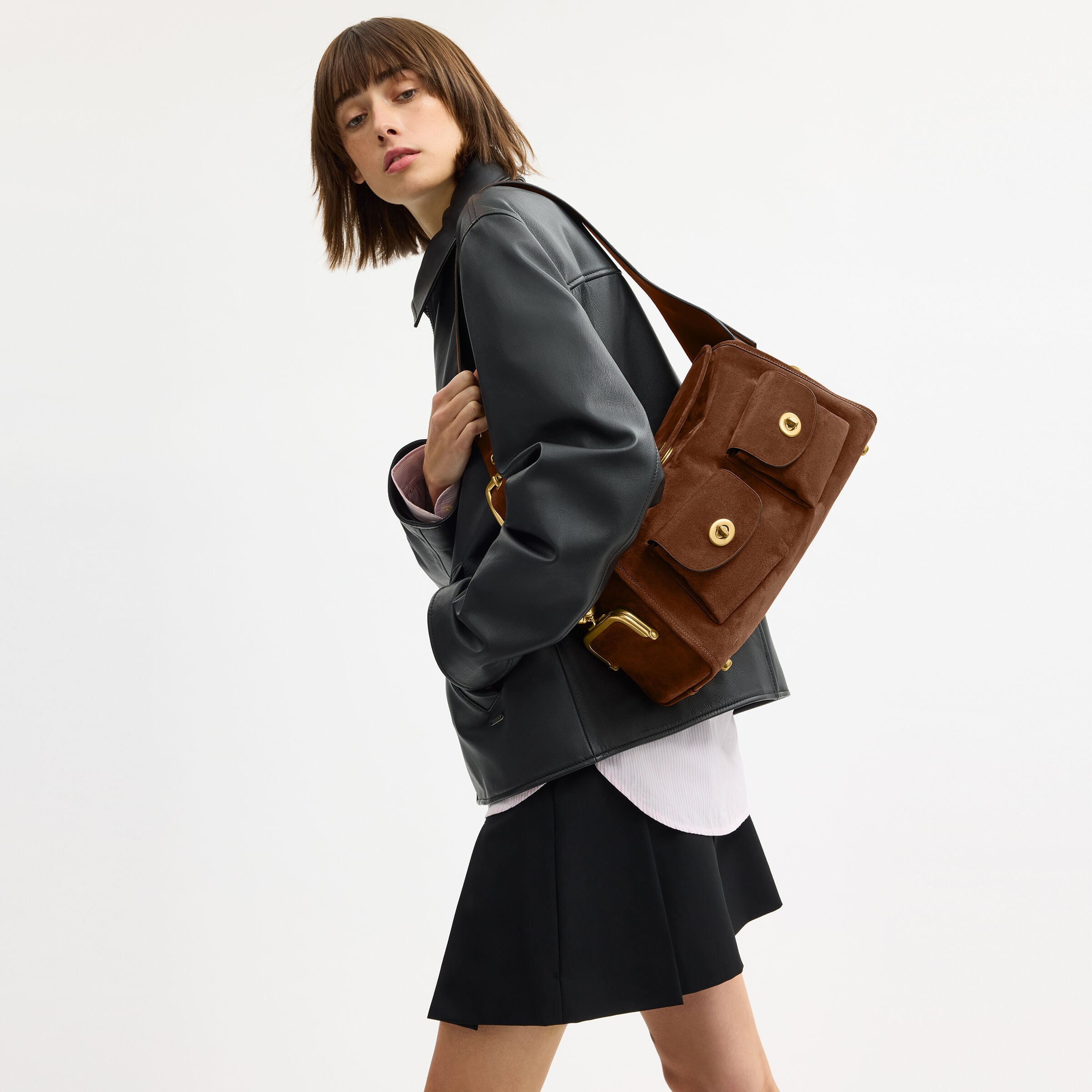 Buy COACH Turnlock Haversack Bag Brown Online in UAE