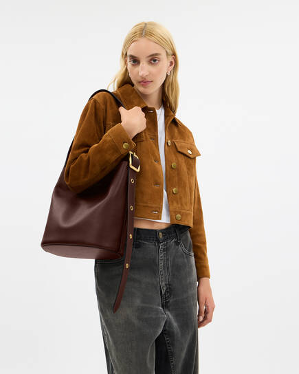 Buy COACH Bleecker Bucket Bag DARK BROWN Online in UAE