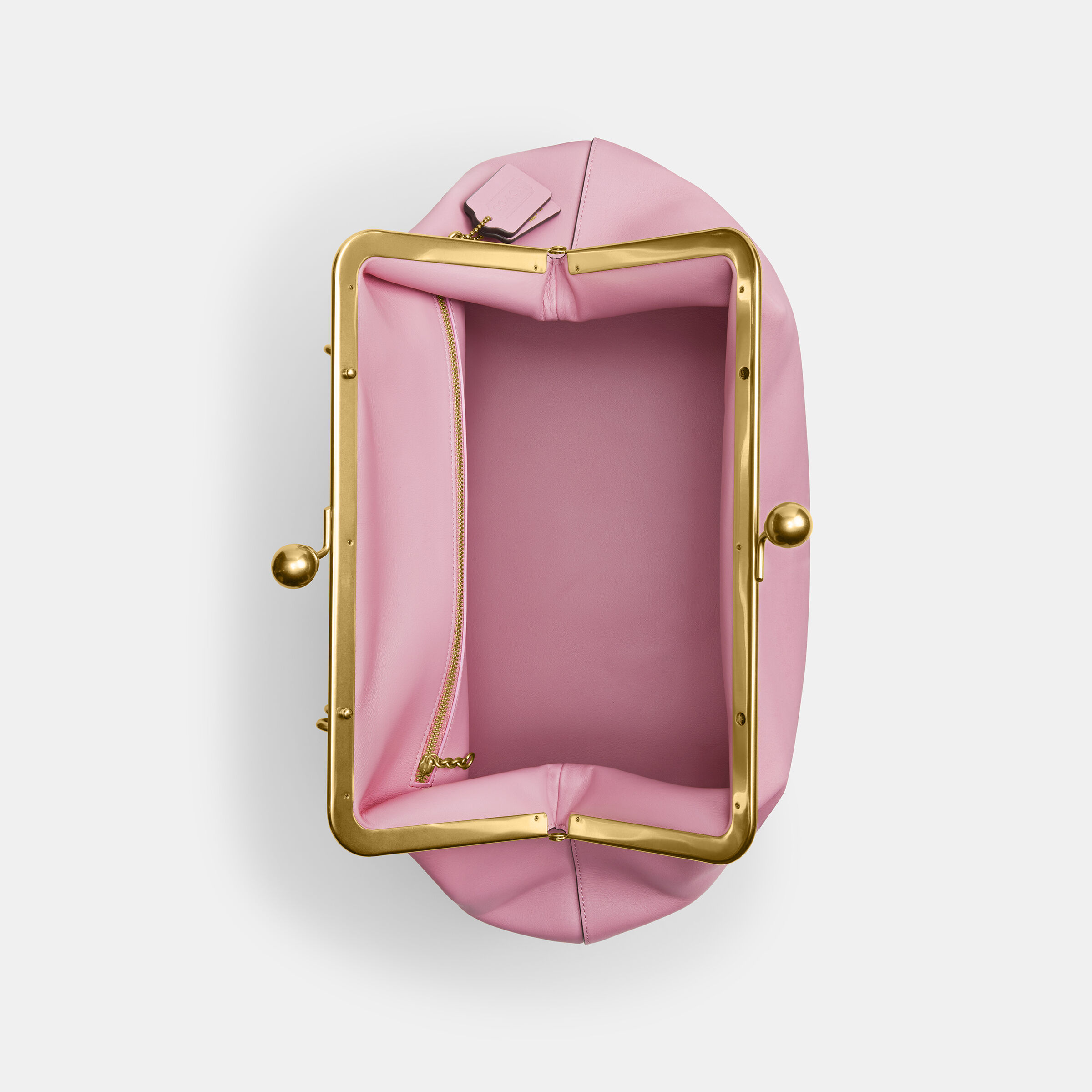 Buy COACH Large Kisslock Frame Bag Dark Pink Online in UAE