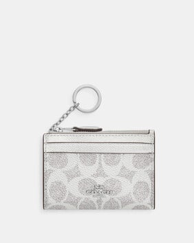 Mini Skinny Id Case In Signature Canvas
