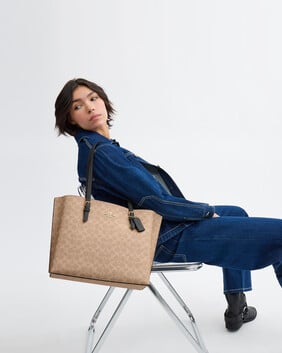 حقيبة يد مولي قماش قنب محفور بشعار الماركة