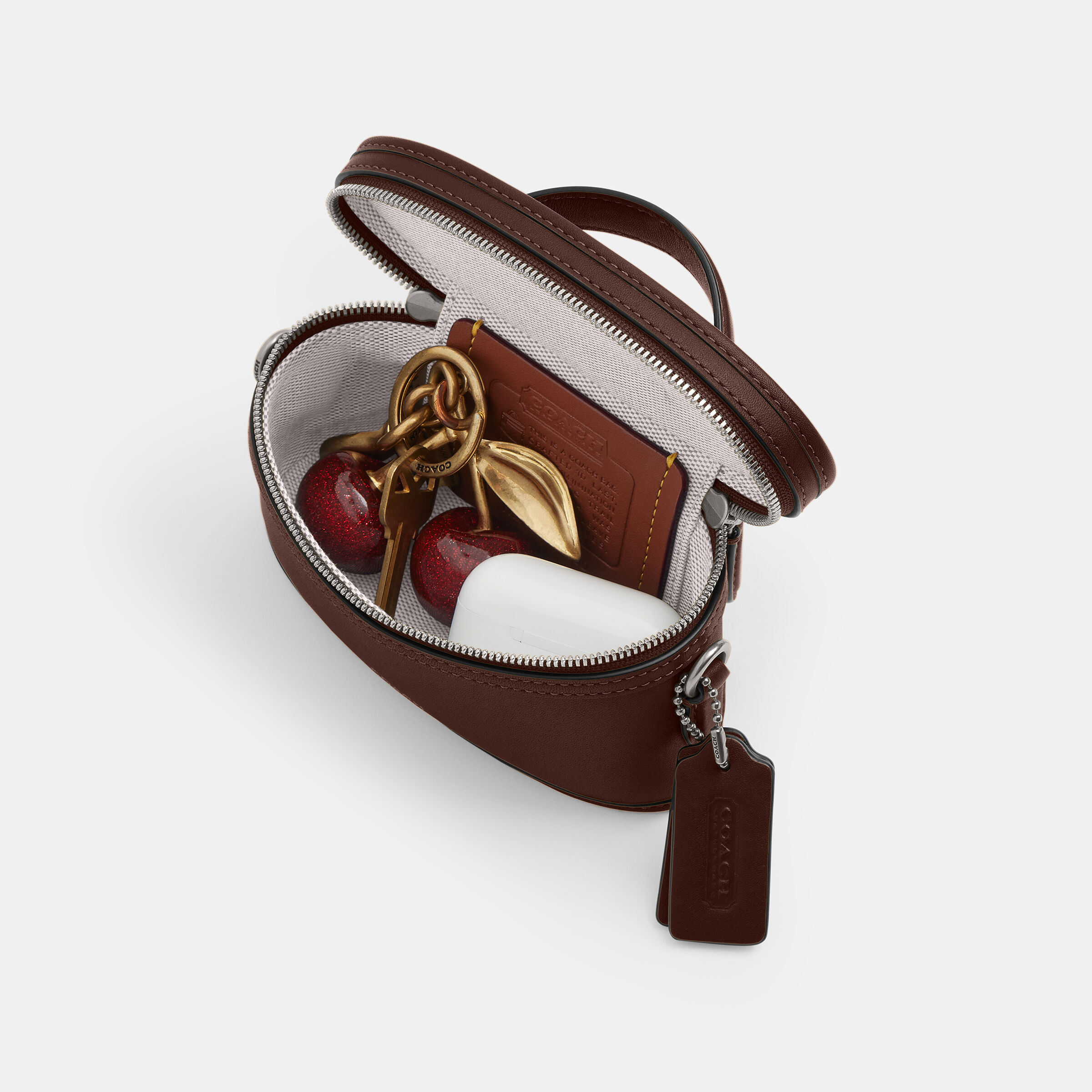Buy COACH Glovetanned Leather Trail Bag 15 DARK BROWN Online in Kuwait