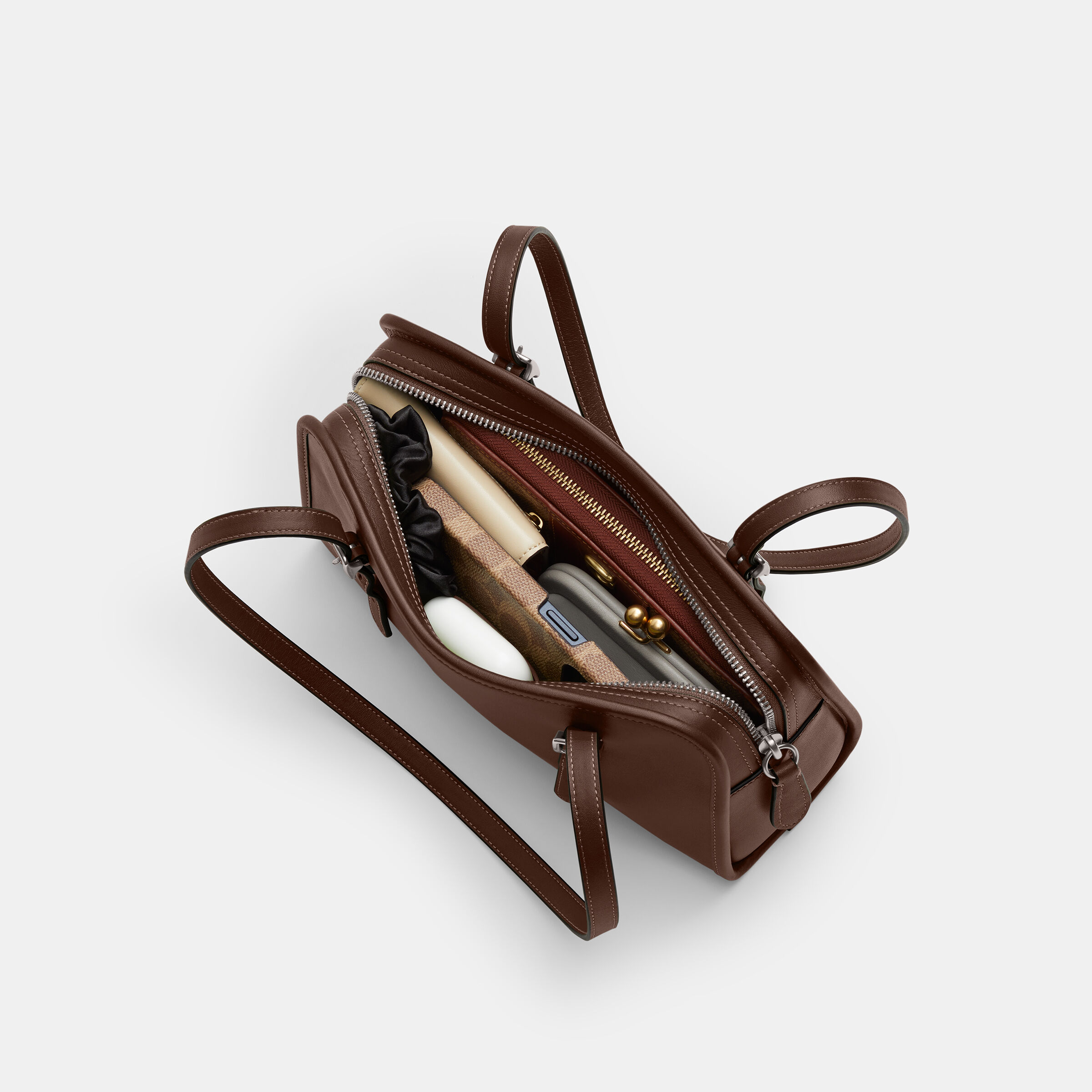 Buy COACH Swing Zip Bag 26 Brown Online in Kuwait