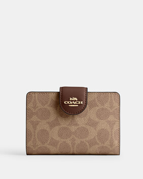 Medium Corner Zip Wallet In Signature Canvas