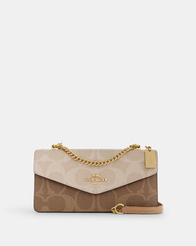 Klare Envelope Crossbody Bag In Blocked Signature Canvas