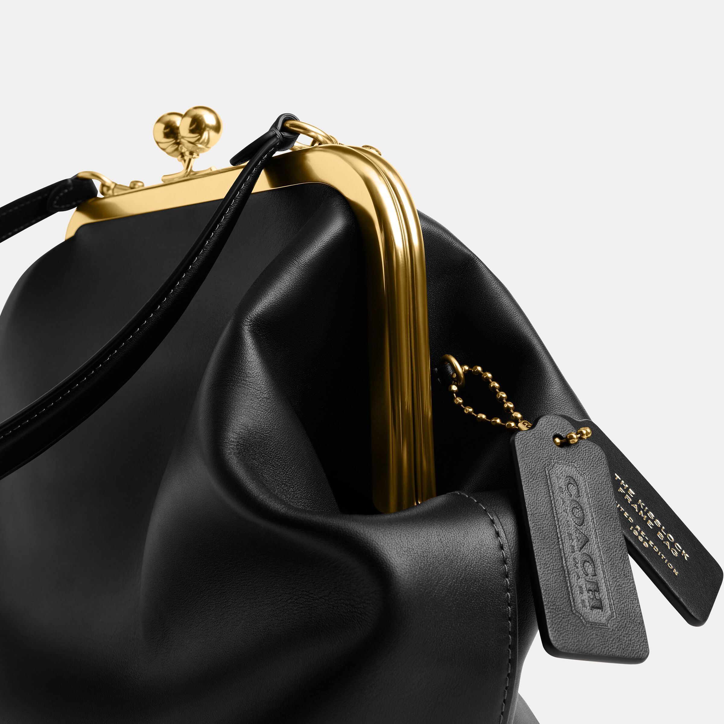 Buy COACH Kisslock Frame Bag 27 Black Online in UAE