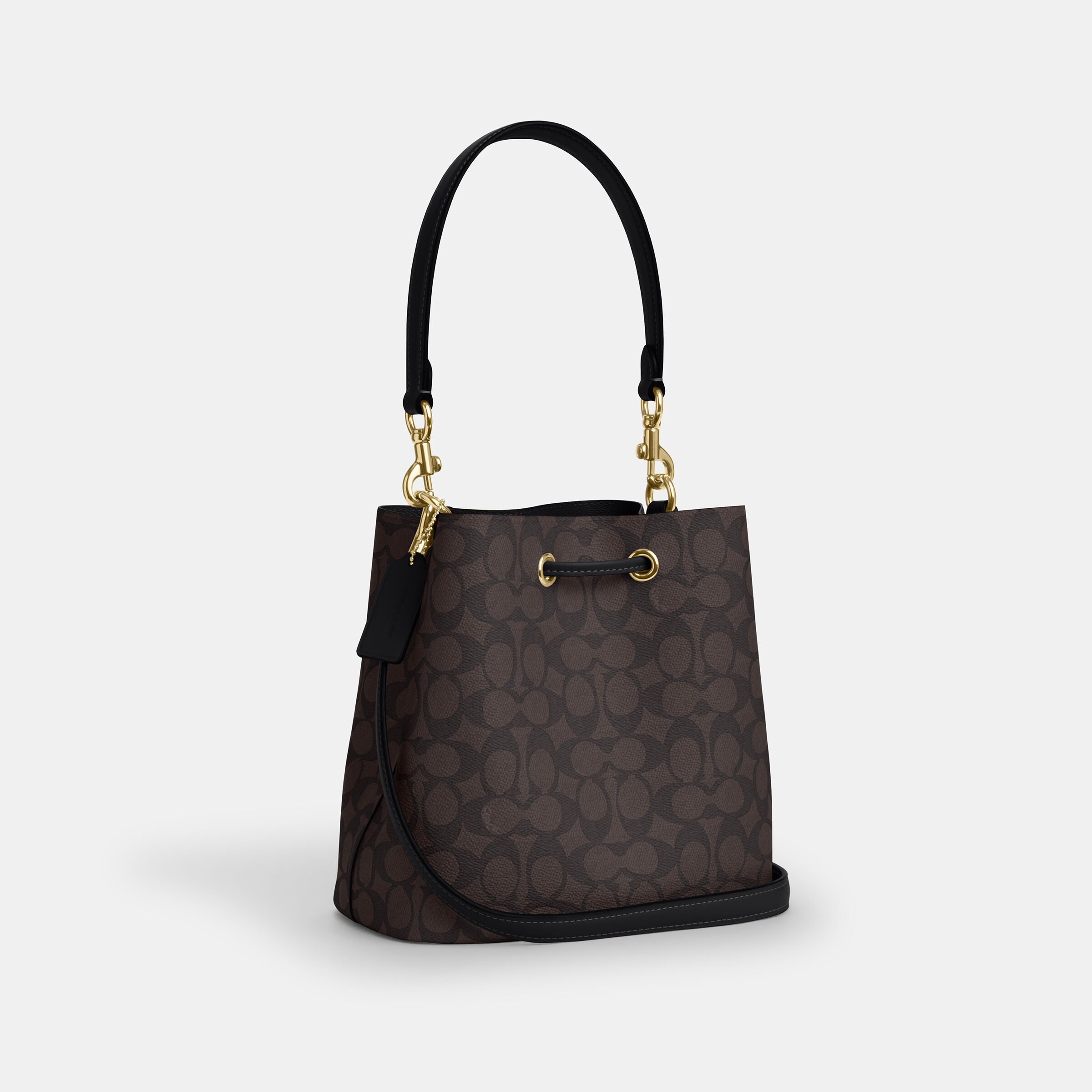 Buy COACH Rowan Bucket Bag In Signature Canvas DARK BROWN Online