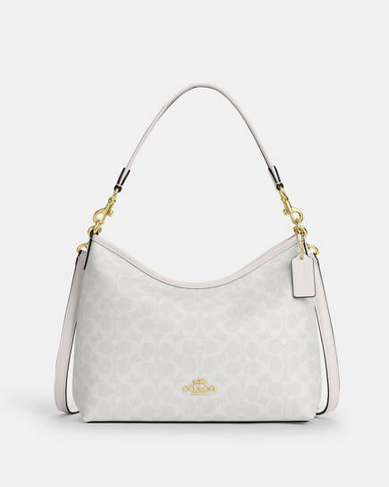Buy COACH Laurel Shoulder Bag In Signature Canvas WHITE Online in UAE