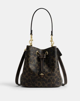 Rowan Bucket Bag In Loved Signature Canvas With Charms