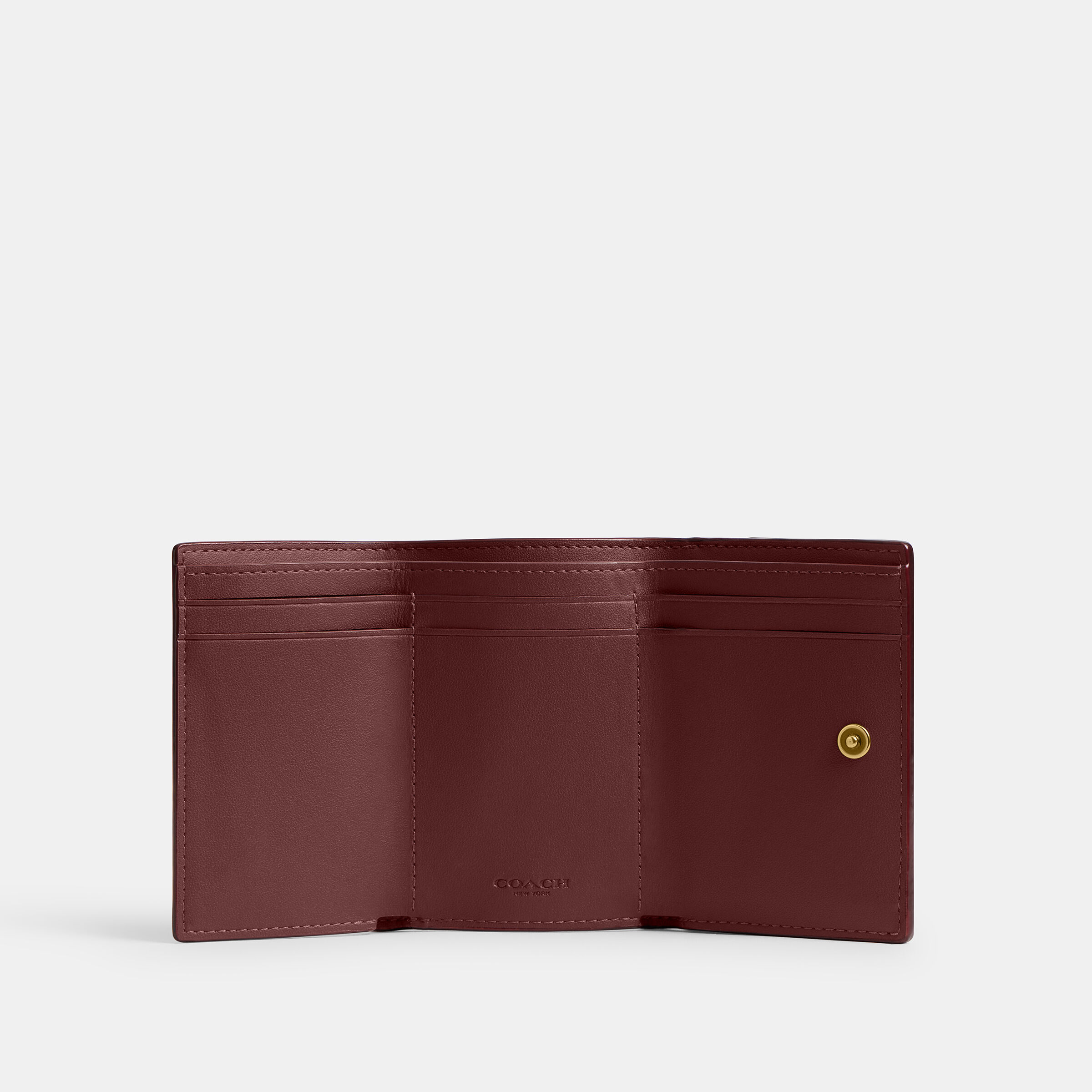 Buy COACH Mini Trifold Wallet In Signature Canvas Light/Pastel