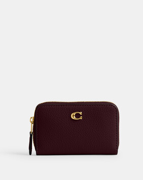 حافظة بطاقات إسنشال صغيرة بسحاب محيط