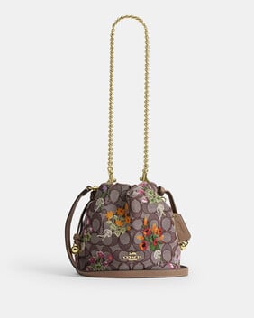 Faye Mini Drawstring Bag In Signature Jacquard With Floral Embroidery