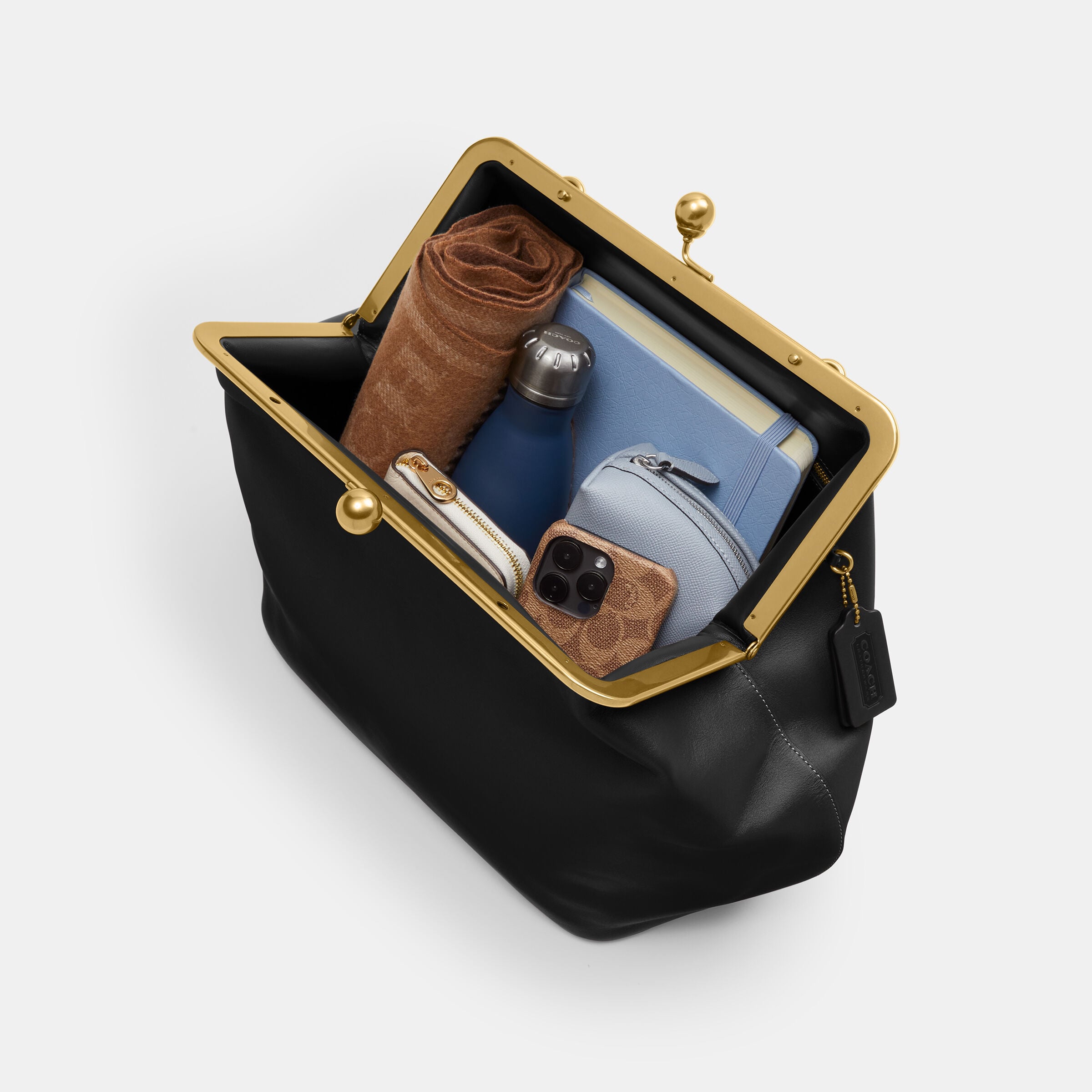 Buy COACH Large Kisslock Frame Bag Black Online in UAE