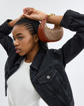 Buy COACH Jonie Bag In Signature Canvas 15 Light/Pastel Brown