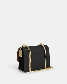 حقيبة كروس كَلاير صغيرة قنب مزين بشعار الماركة