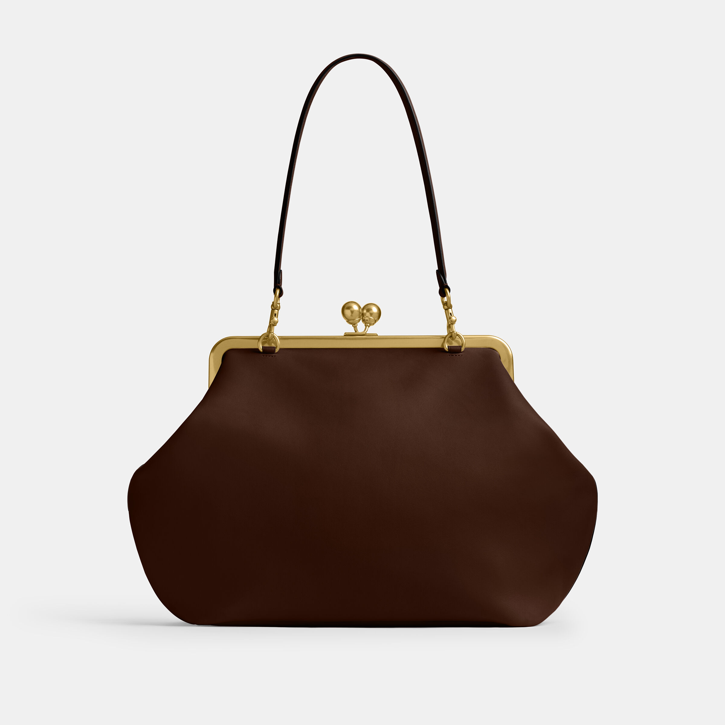 Buy COACH Large Kisslock Frame Bag DARK BROWN Online in UAE