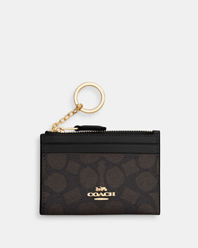 Mini Skinny Id Case In Signature Canvas