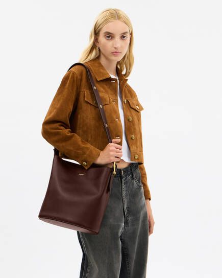 Buy COACH Bleecker Bucket Bag DARK BROWN Online in UAE