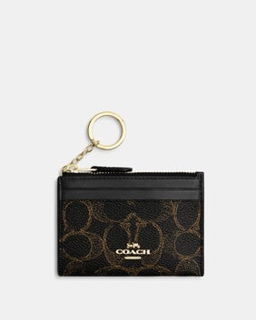 Mini Id Skinny In Loved Signature Canvas