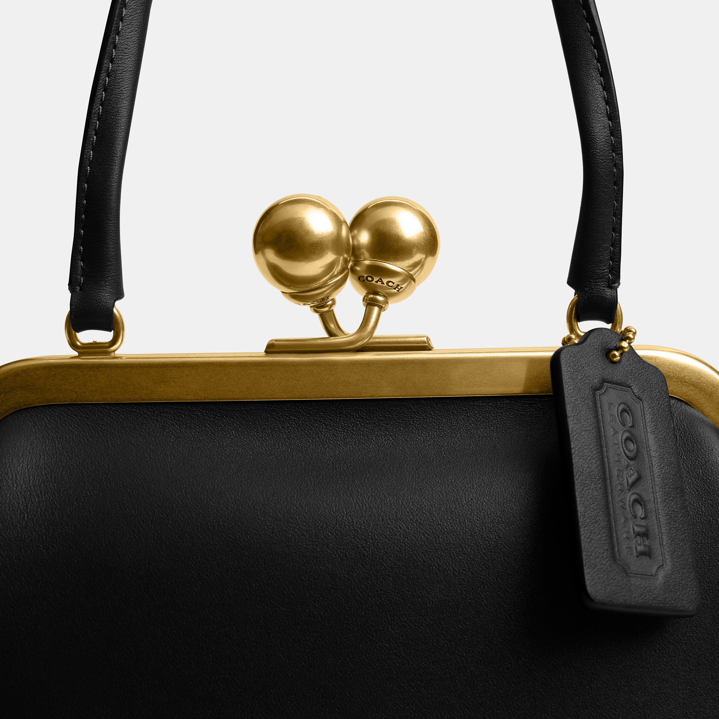 Buy COACH Kisslock Frame Bag 16 Black Online in UAE