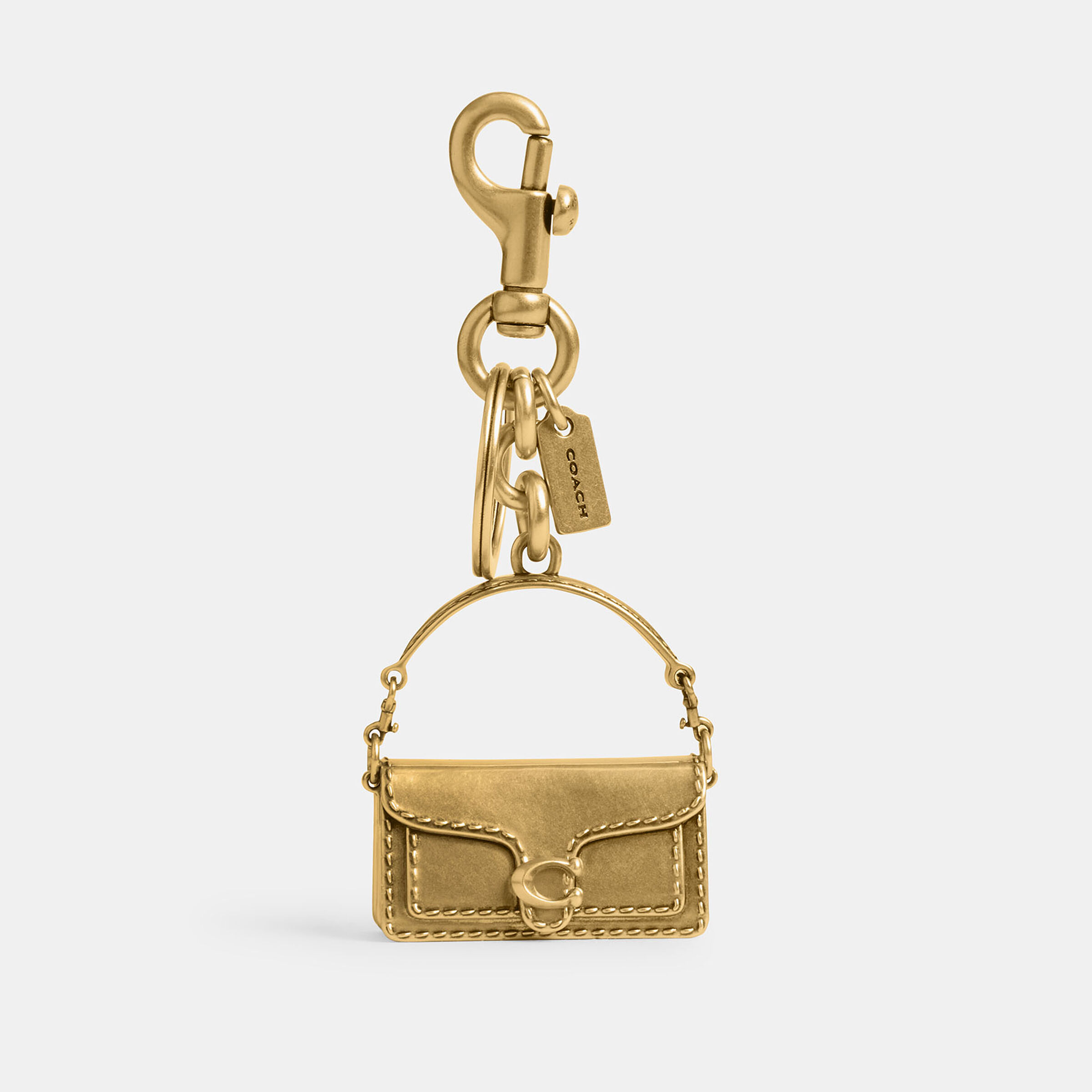 Buy COACH Tabby Bag Charm Gold Online in UAE