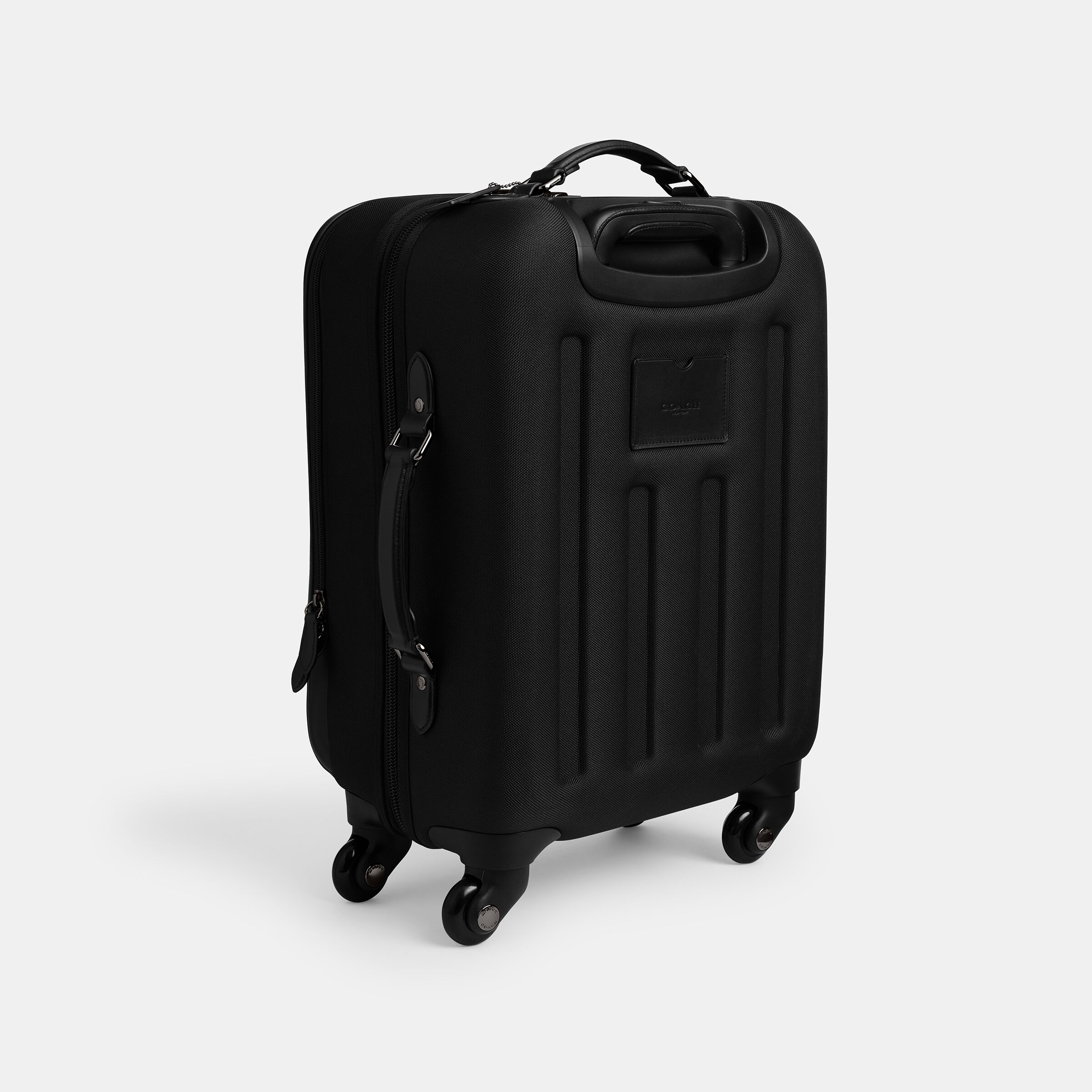 Buy COACH Wheeled Carry On In Signature Canvas Black Online in UAE