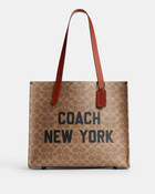 Relay Tote Bag 34 In Signature Canvas With Coach Graphic