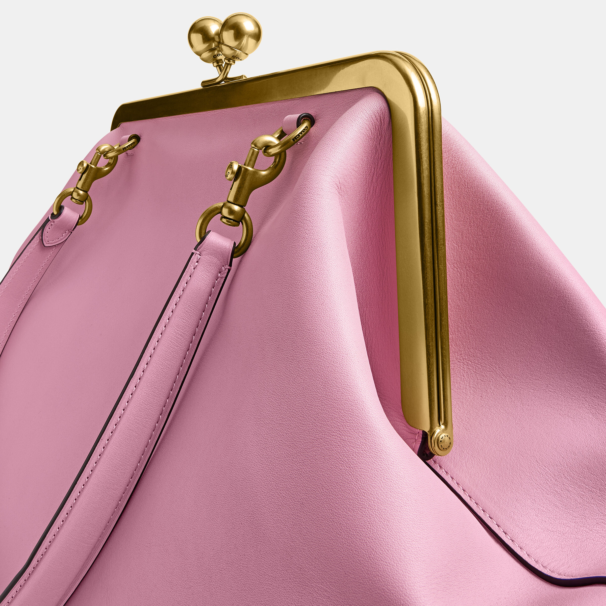 Buy COACH Large Kisslock Frame Bag Dark Pink Online in UAE