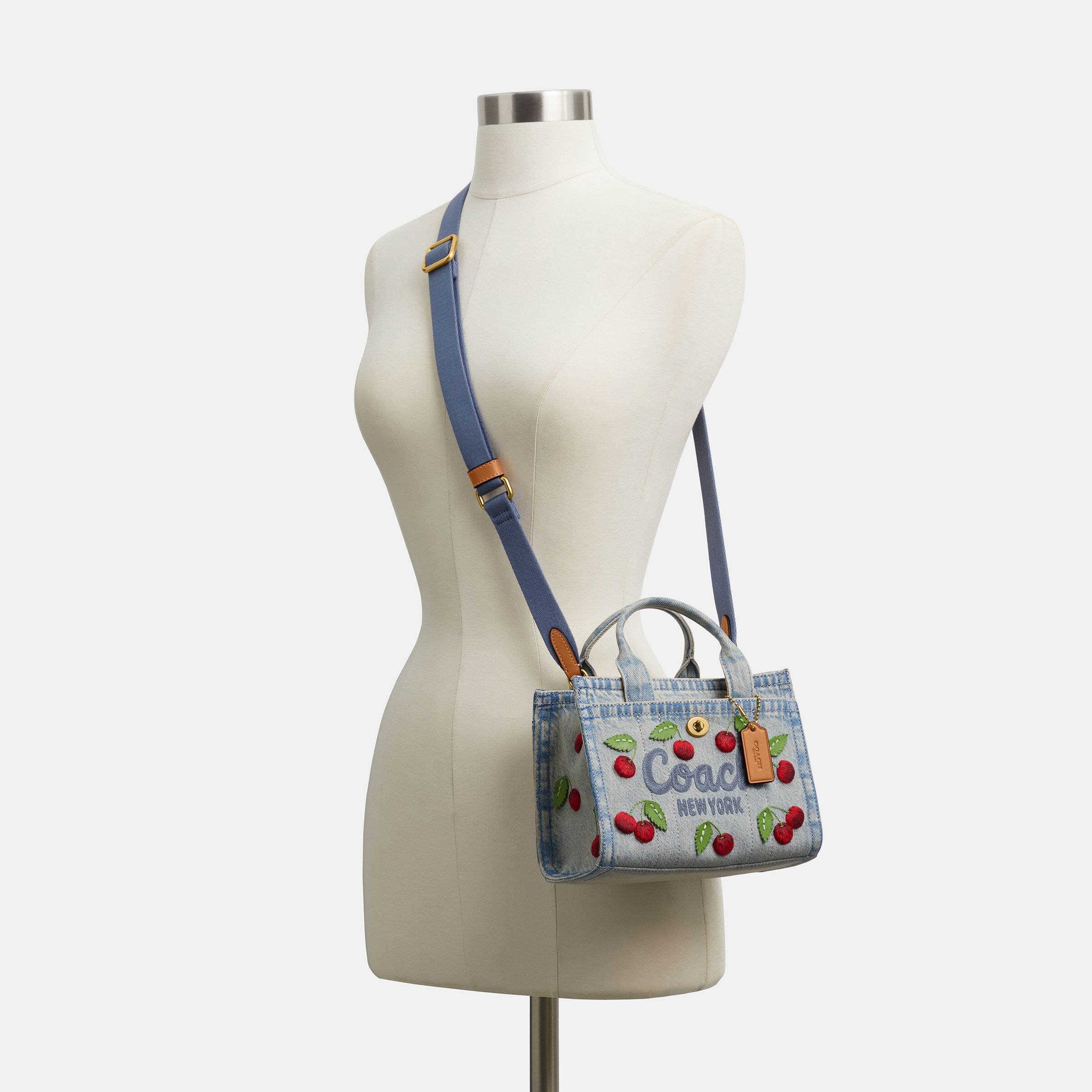 Buy COACH Embroidered Cherry Denim Cargo Tote 20 Blue Online in UAE