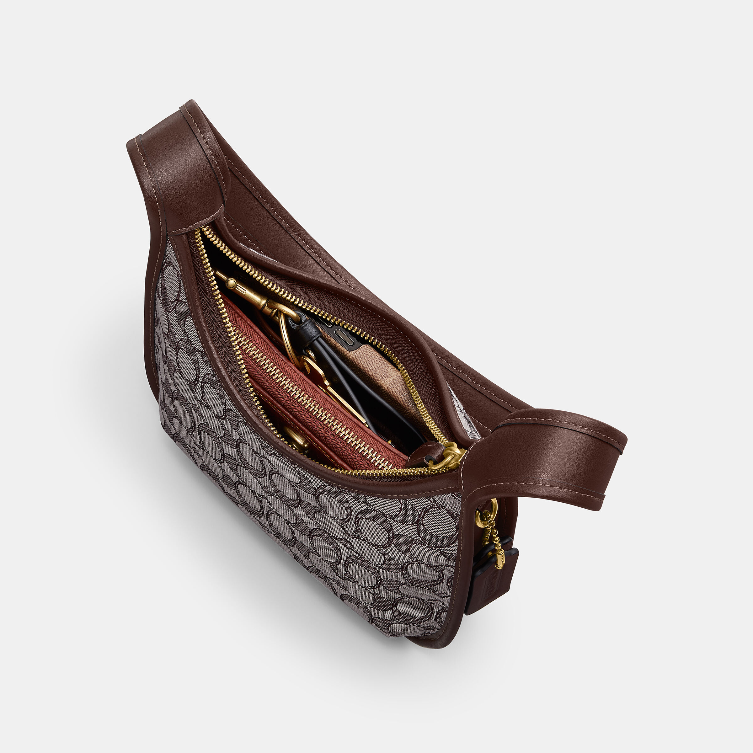 Buy COACH Curve Zip Bag In Signature Jacquard Dbrown Online in UAE