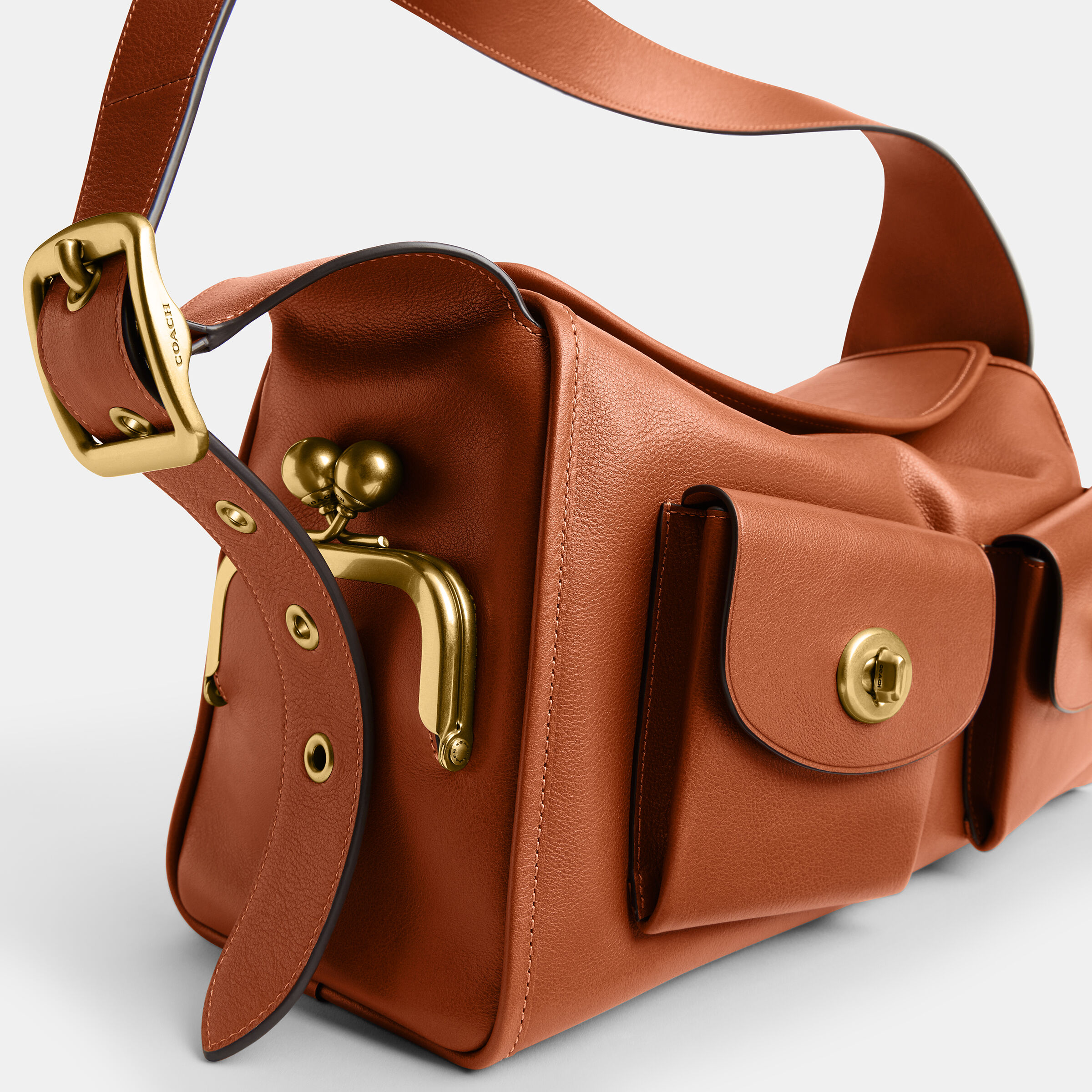 Buy COACH Turnlock Haversack Bag Brown Online in UAE