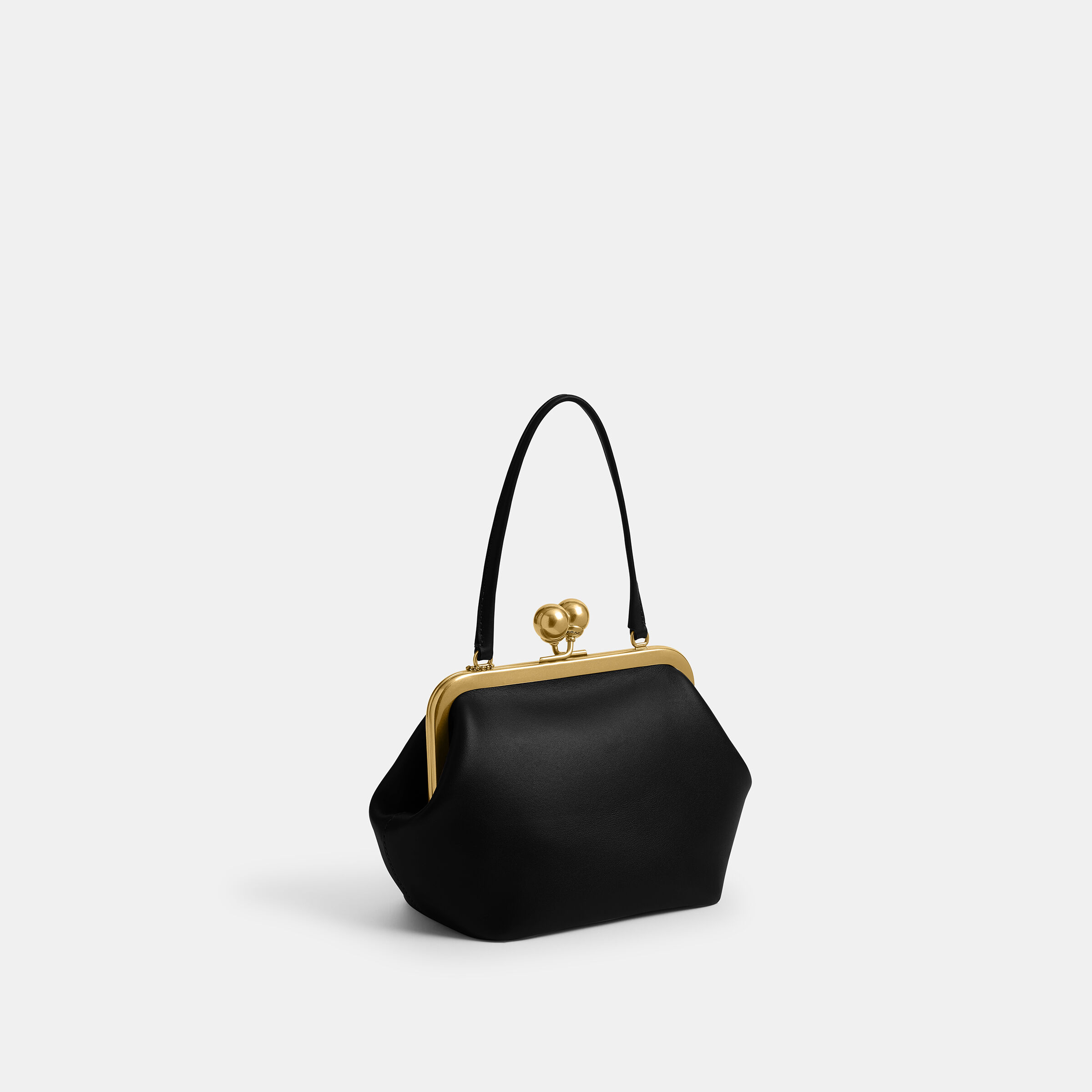 Buy COACH Kisslock Frame Bag 16 Black Online in UAE