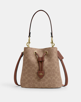 Rowan Bucket Bag In Signature Canvas