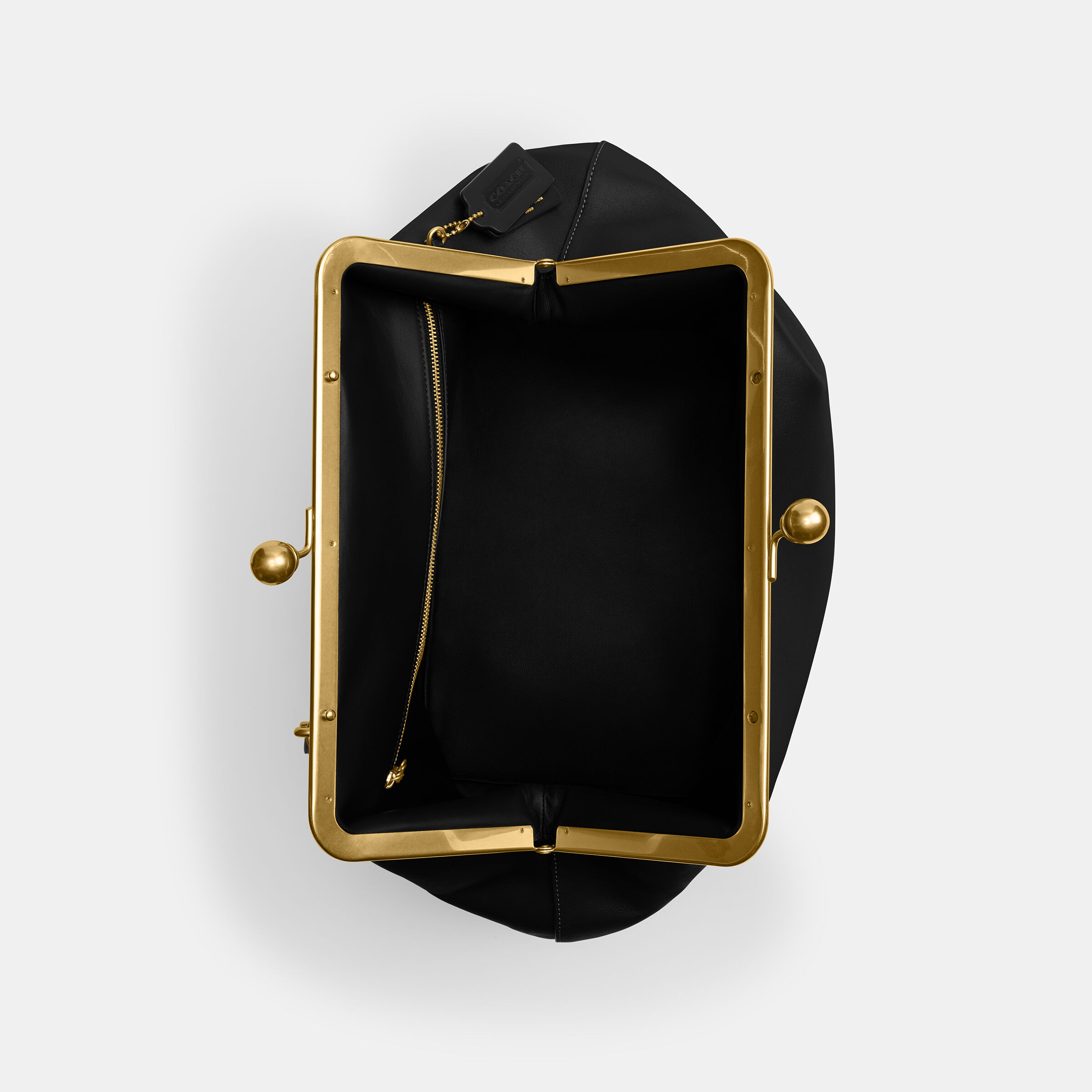 Buy COACH Large Kisslock Frame Bag Black Online in UAE