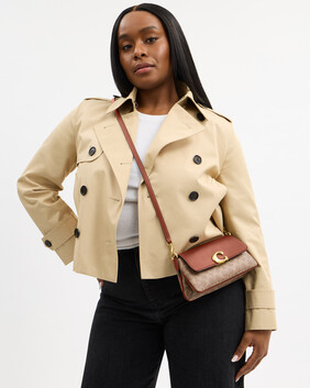 Jet Shoulder Bag In Signature Canvas