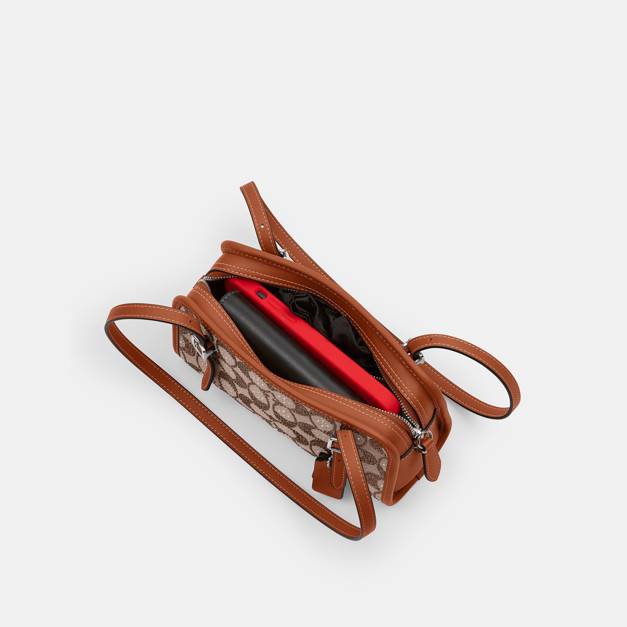 COACH​

Bag Buy COACH Swing Zip Bag 20 In Crystal Signature Jacquard Brown