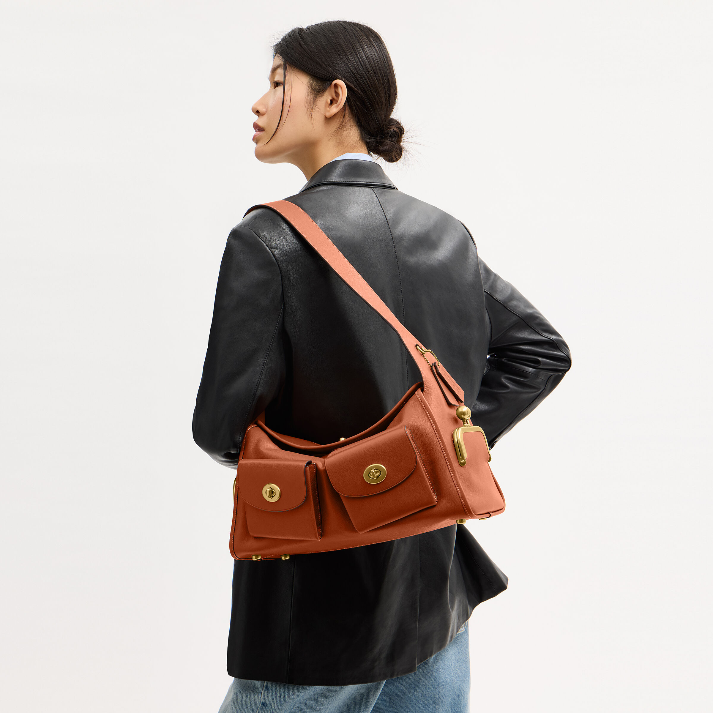 Buy COACH Turnlock Haversack Bag Brown Online in UAE