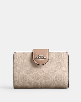 Medium Corner Zip Wallet In Signature Canvas